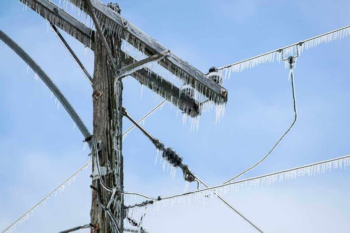 175418288 featured image Icicles hanging from power lines and pole.