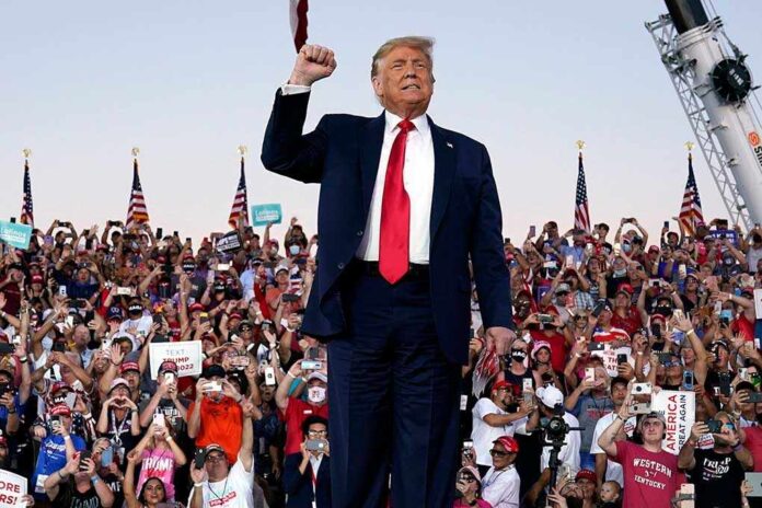 1832698993 featured image Person standing in front of cheering crowd.