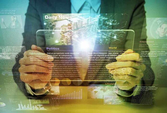 588542129 featured image Person holding transparent tablet displaying digital news content