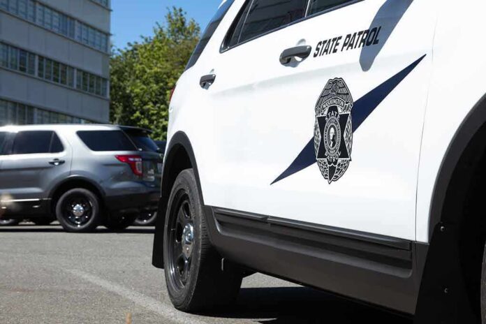 1793471101 featured image State Patrol vehicles parked near a building.