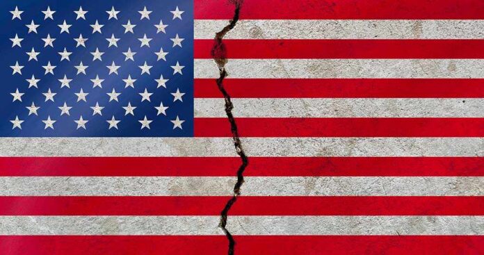 1841229298 featured image American flag with a crack in the middle.