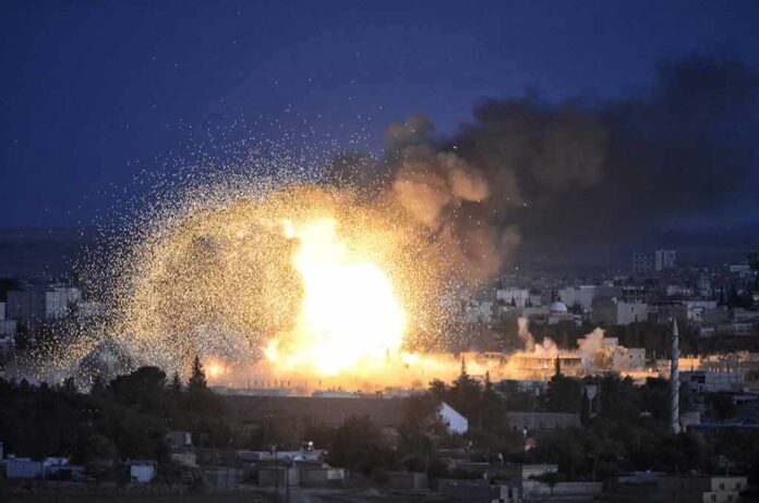 324859307 featured image Large explosion with smoke over a cityscape night
