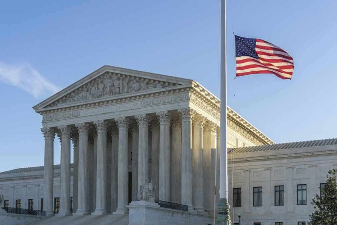 376433869 featured image US flag flying outside a neoclassical government building