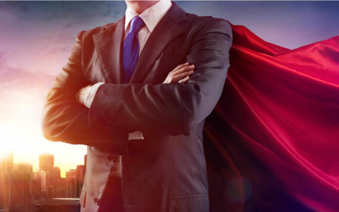 399664645 featured image Businessman wearing a cape standing confidently
