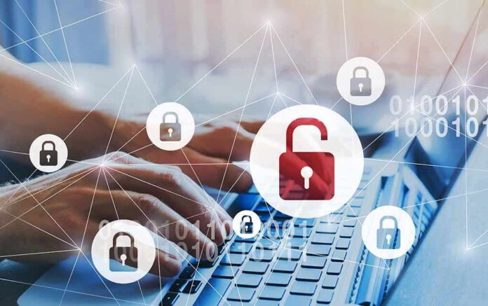 1188354160 featured image Hands typing on laptop with digital lock icons