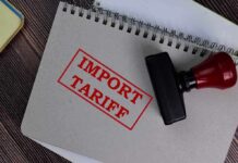 Notebook with Import Tariff stamp and rubber stamper