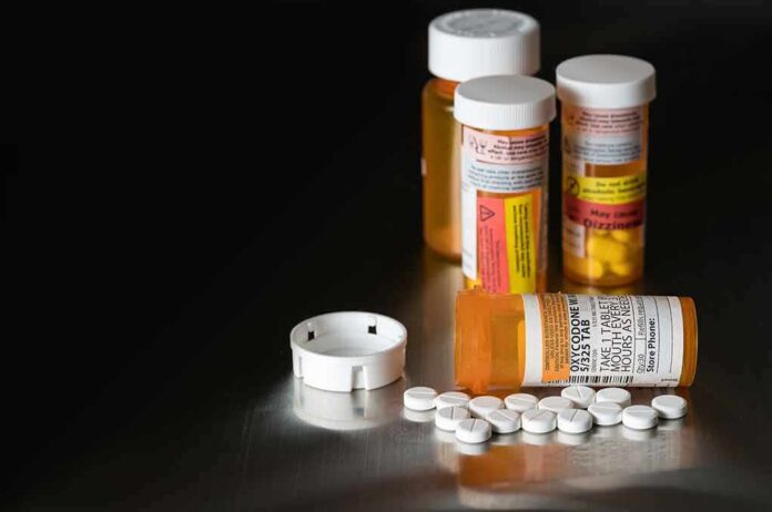 562612954 featured image Pill bottles and tablets on a dark surface