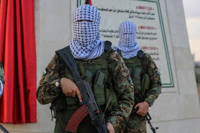 2364420269 featured image Masked soldiers holding rifles in front of a monument
