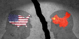 Silhouettes with US and China flags confrontation