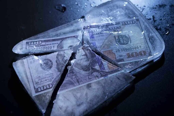 331569191 featured image Hundred-dollar bills frozen in cracked ice block