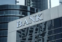 Modern bank building with reflective glass exterior