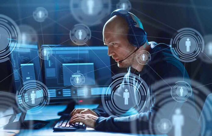 1365221249 featured image Man with headset working at computer holographic icons