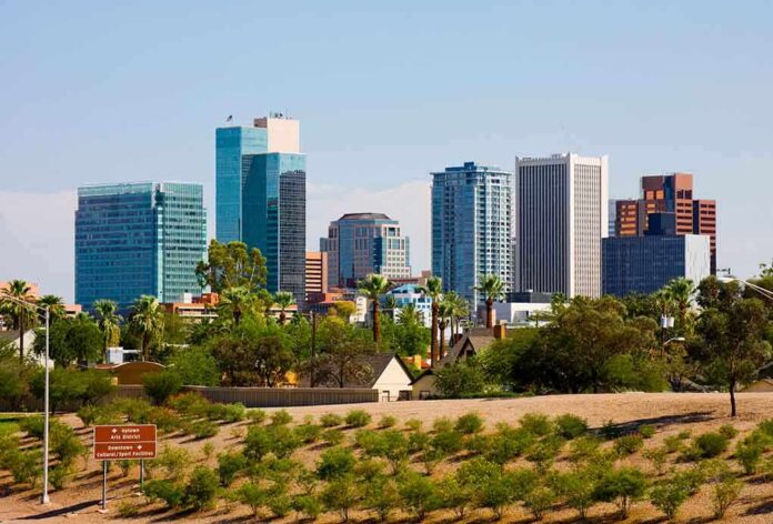 Skyline of Phoenix with modern buildings and desert landscape in the foreground