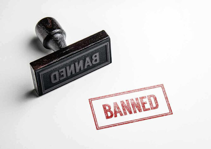 423625090 Banned stamp and rubber stamp on white background.