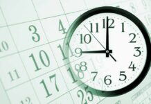 A clock overlaying a calendar, illustrating the concept of time management