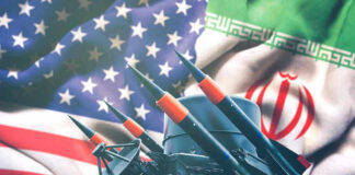 Missiles in front of American and Iranian flags.