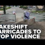 Frustrated residents build gun violence barricades on Seattle's Aurora Ave. side streets
