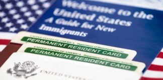 The Citizenship Debate Just Took A Dangerous Turn Permanent resident cards with welcome guide and flag.