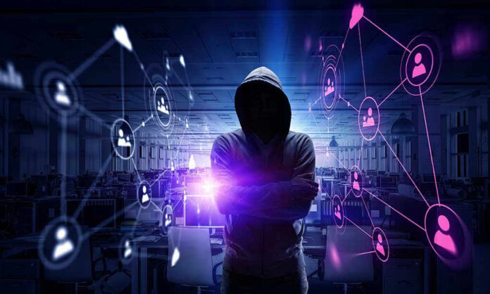 Hacker in hooded sweatshirt with digital connections overlay.