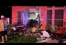 Woman dies after Tesla driver slams into home in Katy area