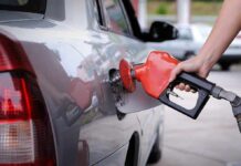 Why Cheap Oil Doesn’t Mean Cheap Gas A person refueling a car at a gas station