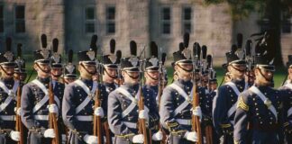 Uniformed soldiers in formation during a military parade