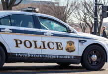 Secret Service Meltdown Exposed United States Secret Service police car on roadside.