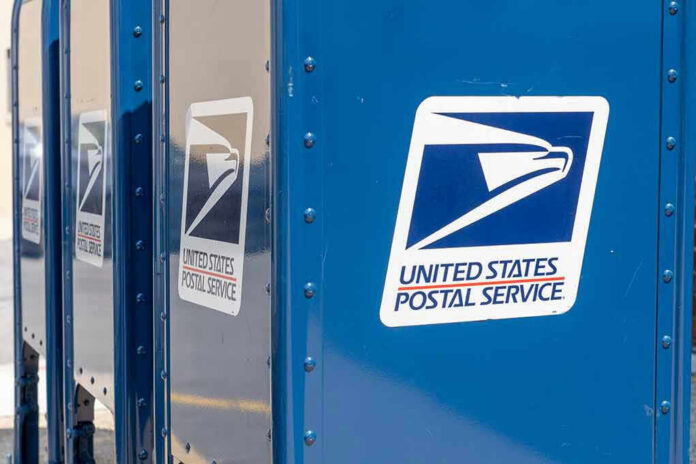 1798124164 Blue USPS mail collection boxes in a row.