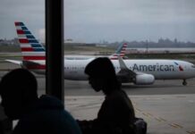American Airlines flights grounded across US amid IT outage, report says