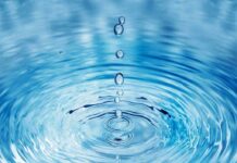 Feds Eye Massive Colorado River Shutdown Close-up of water droplets creating ripples in a blue water surface
