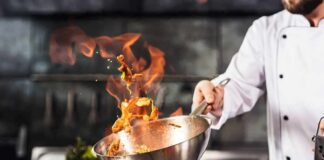 TV Chef Arrest Stuns Fans Chef tossing food in a flaming pan