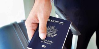 Vacation Turns Felony Over One Forgotten Bullet A person holding a United States passport next to a suitcase