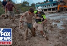 Nepal flood risk forces rescue operations to pause