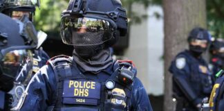 K-9 Leap Into Action Ending 40-Minute Battle Riot police officer in tactical gear with helmet and visor