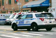 66-Year-Old Rabbi Attacked on Brooklyn Street Police car and ambulances outside emergency room entrance.