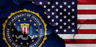 FBI seal and American flag on cracked wall