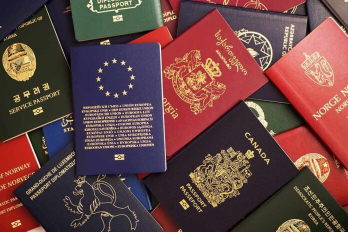 Assorted international passports spread out on a surface