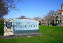 Catholic Site’s BIZARRE Claim About Jesus University campus sign on a green lawn