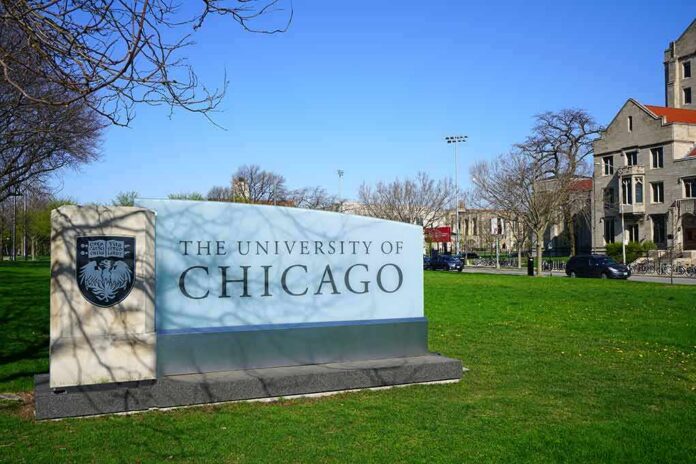 University campus sign on a green lawn