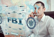 Man on phone behind digital interface with FBI and cybersecurity graphics