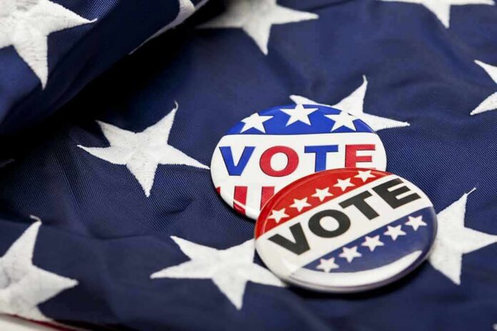 Two vote buttons on a blue star-patterned American flag