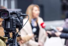 Why Hollywood Quietly Shut Susan Sarandon Out Video camera filming an outdoor media interview