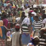 Crowd of people in a busy outdoor market