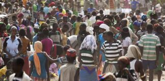 Crowd of people in a busy outdoor market
