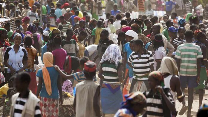 Crowd of people in a busy outdoor market