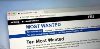 FBI Operation Finds 1,410 CHILD Victims Computer screen showing an FBI Most Wanted webpage