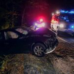 9-Year-Old STABBED After Highway Crash Crashed car on a dark roadside with emergency vehicles