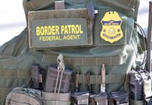 Tactical vest with law enforcement gear and tools