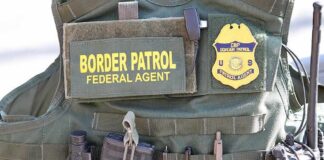 Tactical vest with law enforcement gear and tools