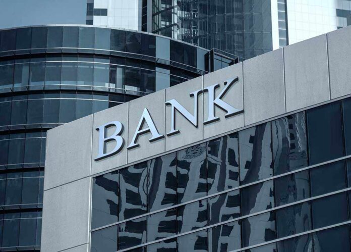 Bank,Building Bank building facade with large sign and glass windows